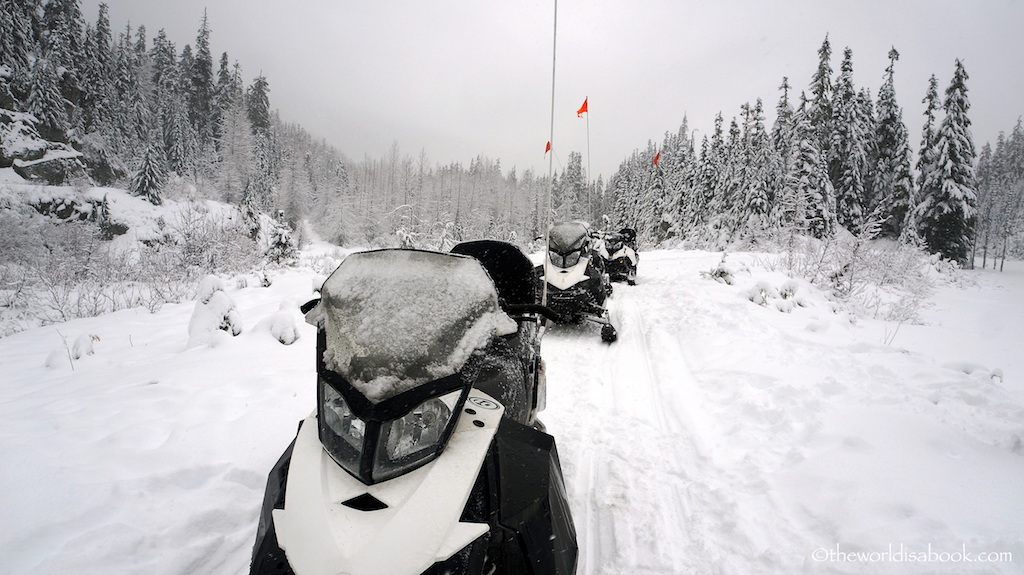 Whislter parked snowmobiles